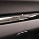 Illustration for article titled The Needlessly Complicated Cupholders in the Porsche 911 Are Awesome